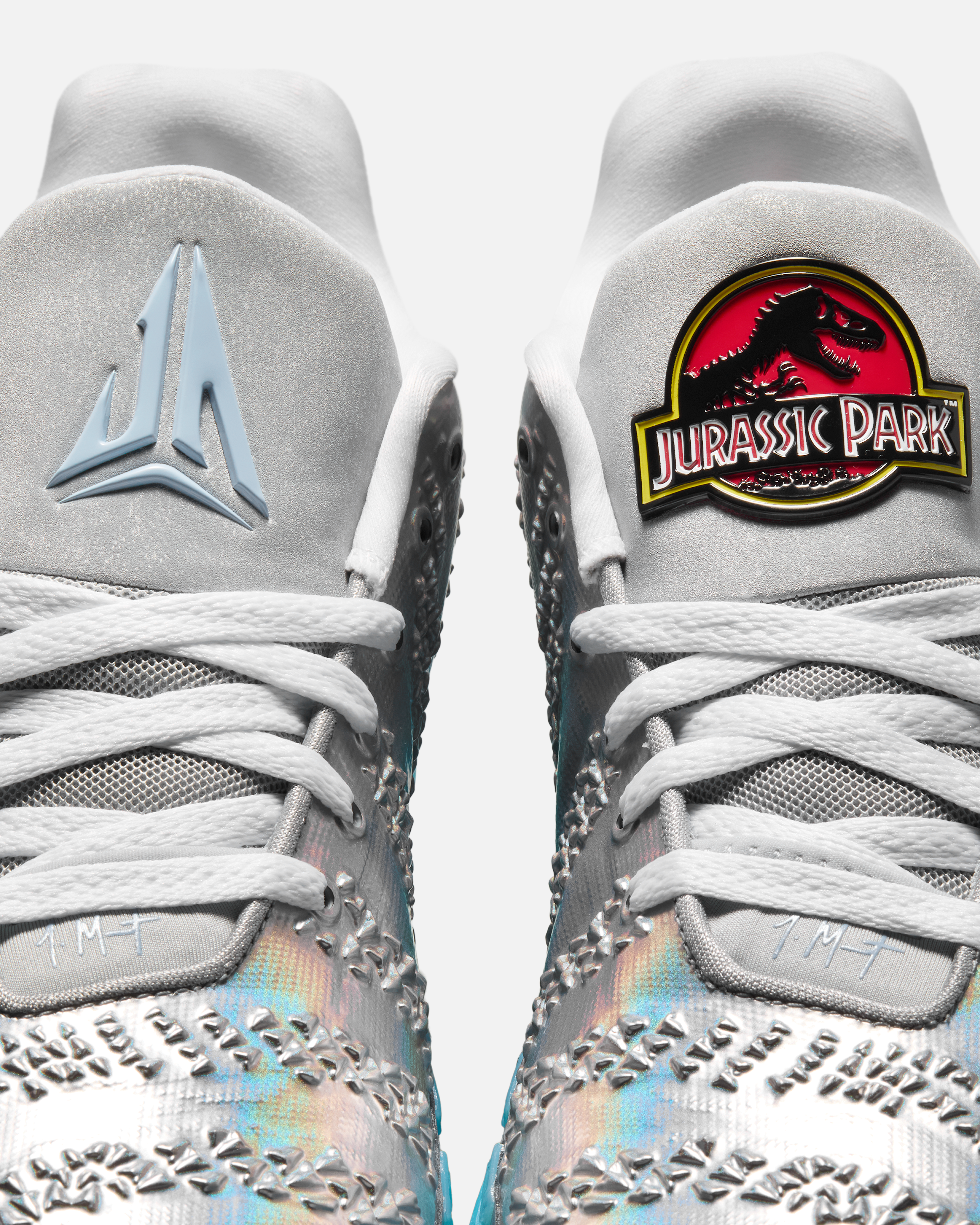 Jurassic Park Nike Ja 3 Metallic Silver in hand images