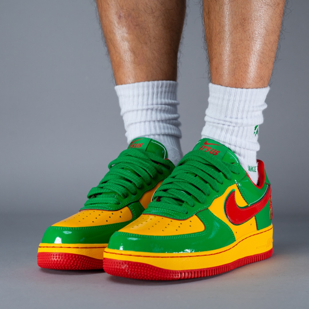Alternate angle of the vibrant red, green, and yellow Nike Air Force 1 “Lucky Green” by Lil Yachty.