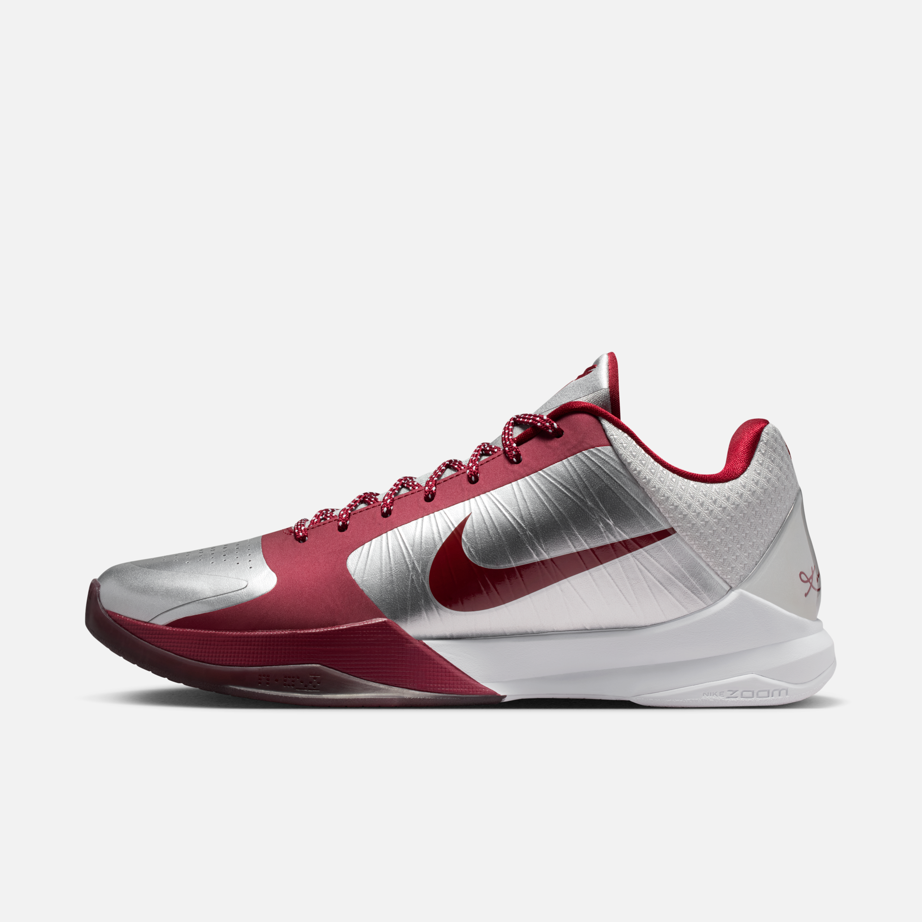 Side view of the Nike Kobe 5 Protro “Lower Merion Away” with silver-red upper and Swoosh