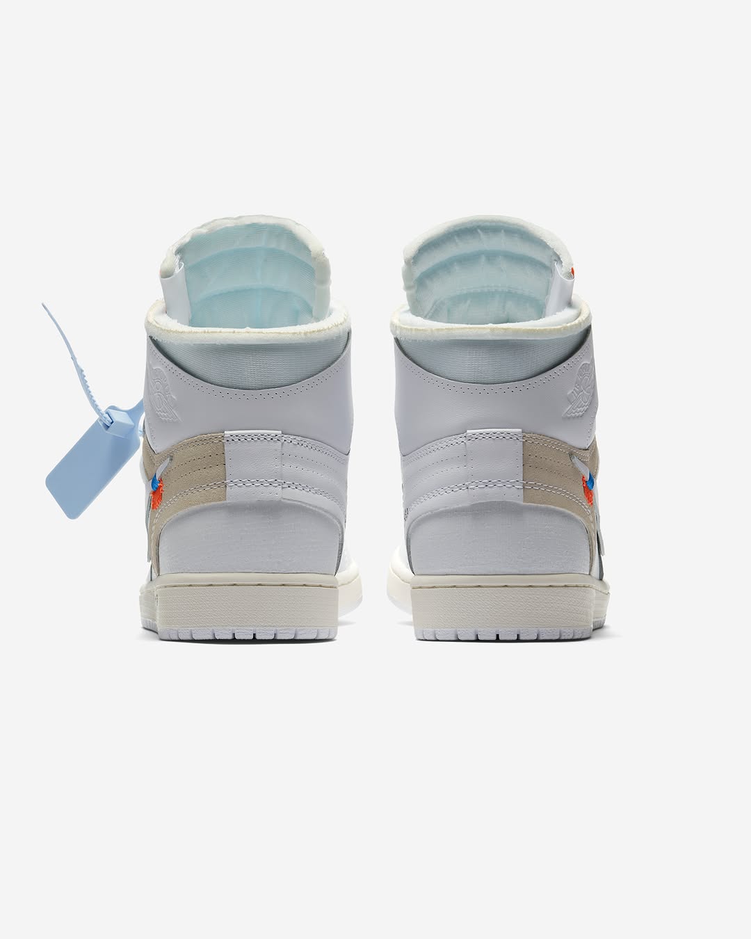 Rear view of the Off-White x Air Jordan 1 “Alaska” showcasing the deconstructed heel and blue zip-tie.