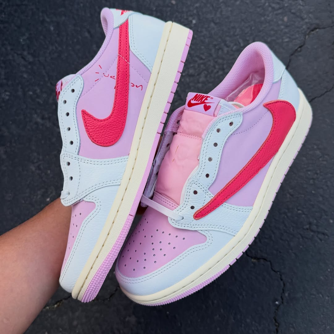 Travis Scott x Air Jordan 1 Low "Tropical Pink" in hand